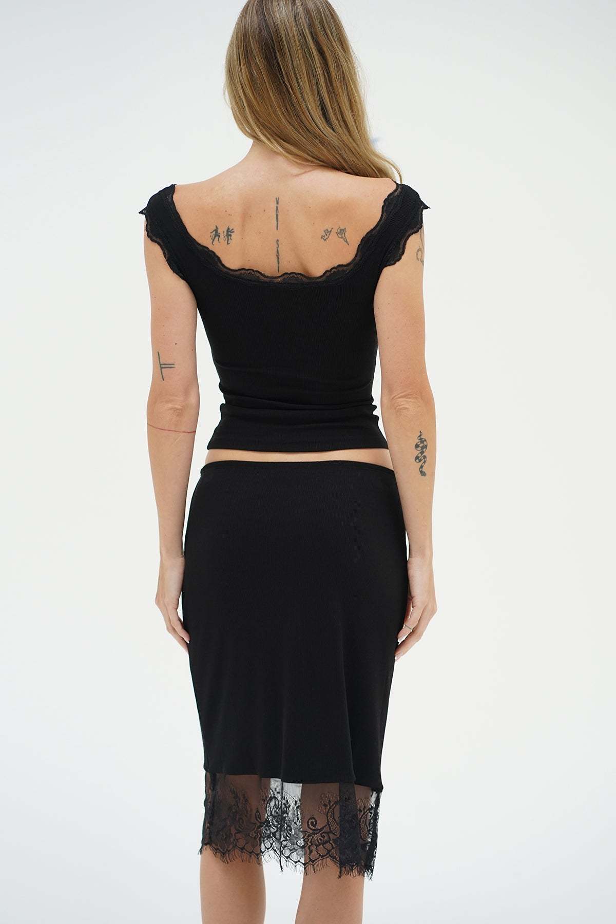 LNA Ryder lace trim skirt in black