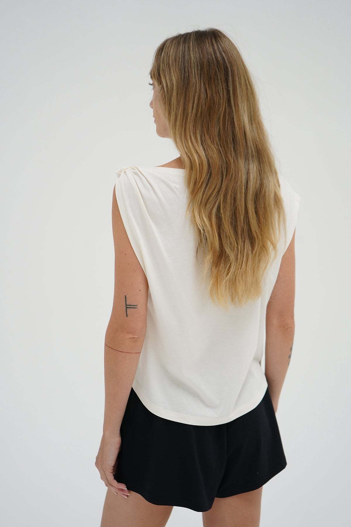 LNA Natia Tee in jet stream with knot detail on one shoulder