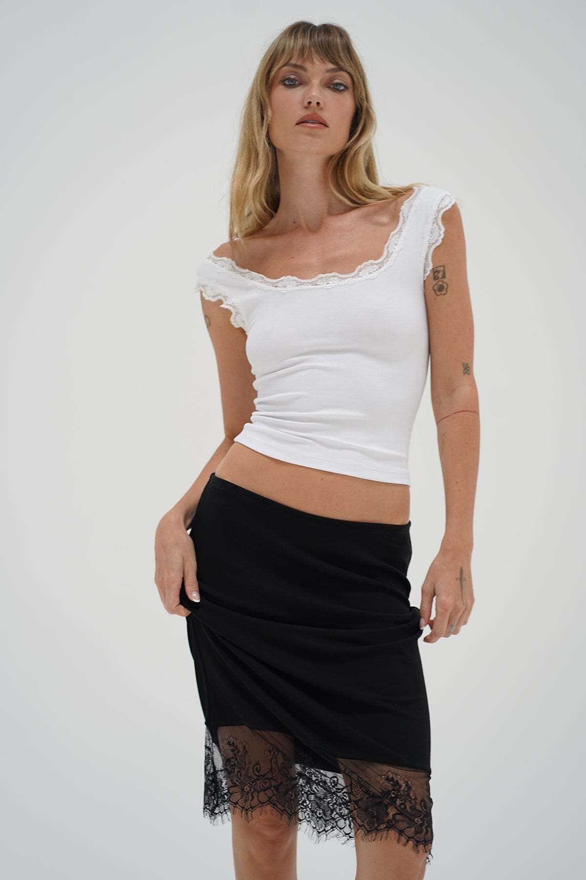 LNA Ryder lace trim skirt in black